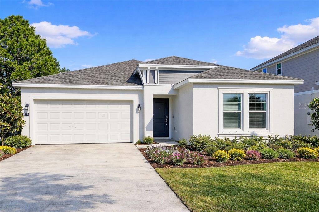 3977 Willowbrook Drive Edgewater, FL 32141 - Photo 1 of 22 a front view of a house with a yard
