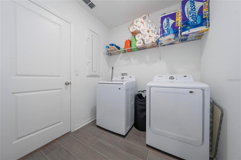 3977 Willowbrook Drive Edgewater, FL 32141 - Photo 11 of 22 a utility room with dryer and washer