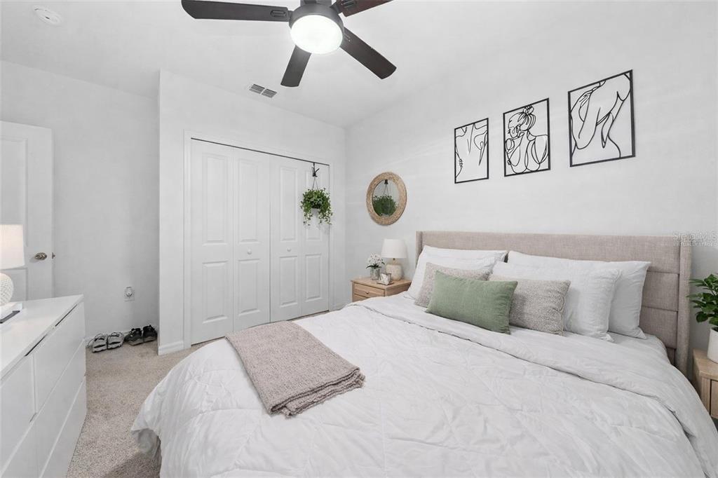 3977 Willowbrook Drive Edgewater, FL 32141 - Photo 19 of 22 a bedroom with a bed and painting on the wall
