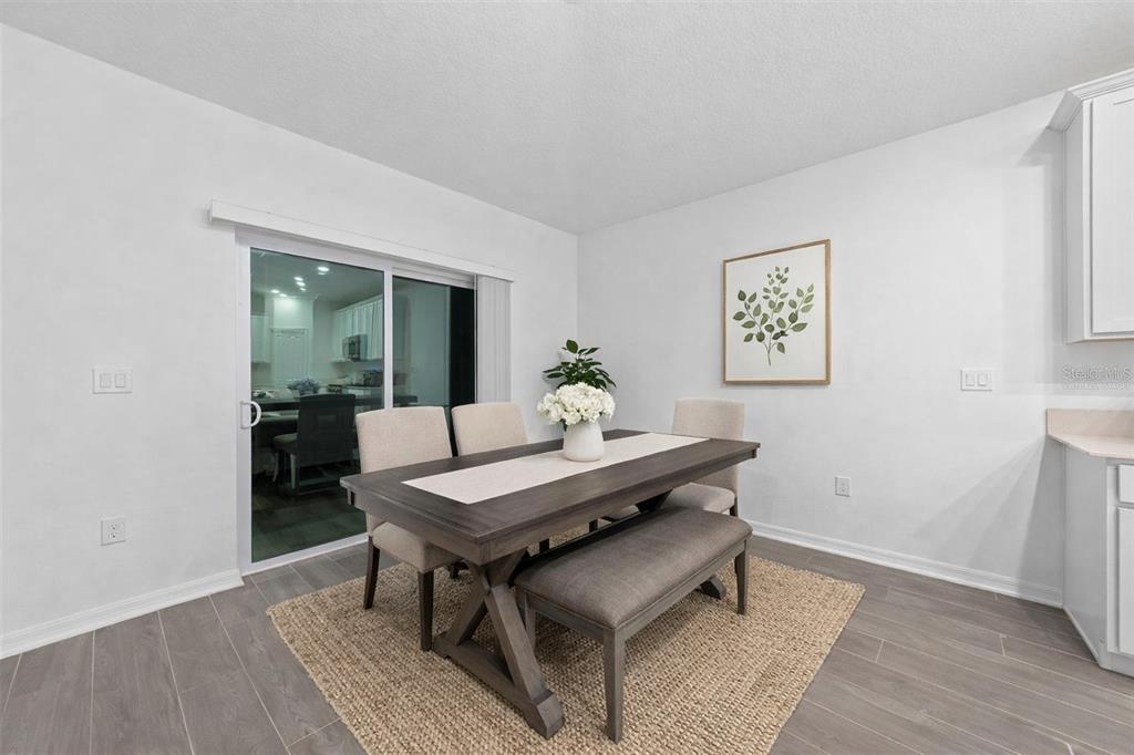 3977 Willowbrook Drive Edgewater, FL 32141 - Photo 7 of 22 a view of a dining room with furniture