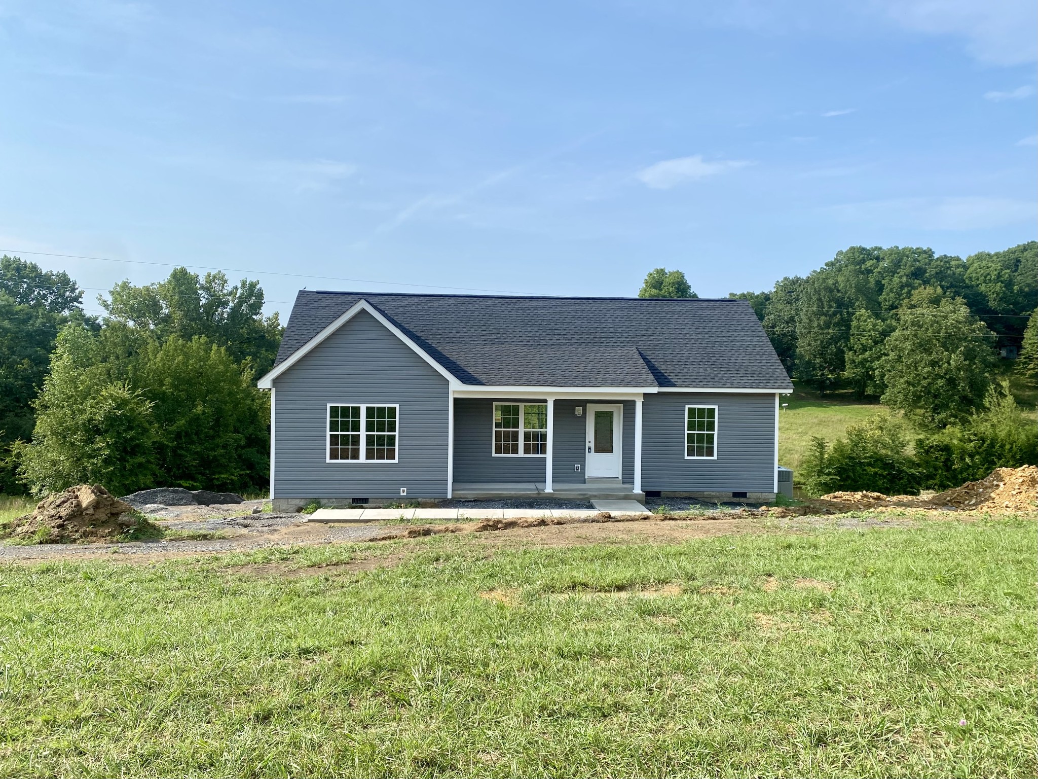 380 Calvert Ridge Road Westmoreland, TN 37186 - Photo 3 of 18 front view of a house with a yard