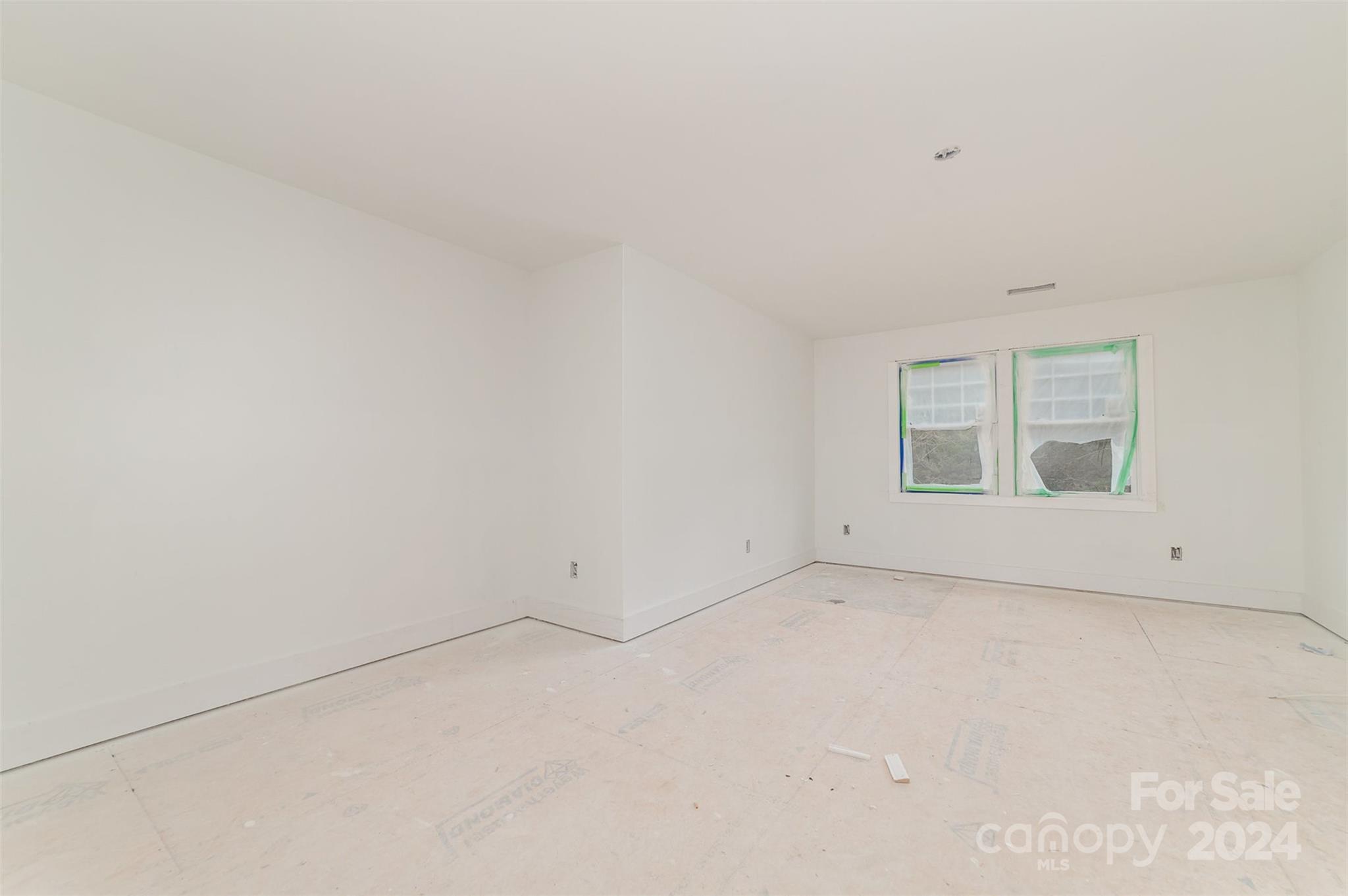 1820 Red Angus Road Mount Pleasant, NC 28124 - Photo 14 of 24 an empty room with a window