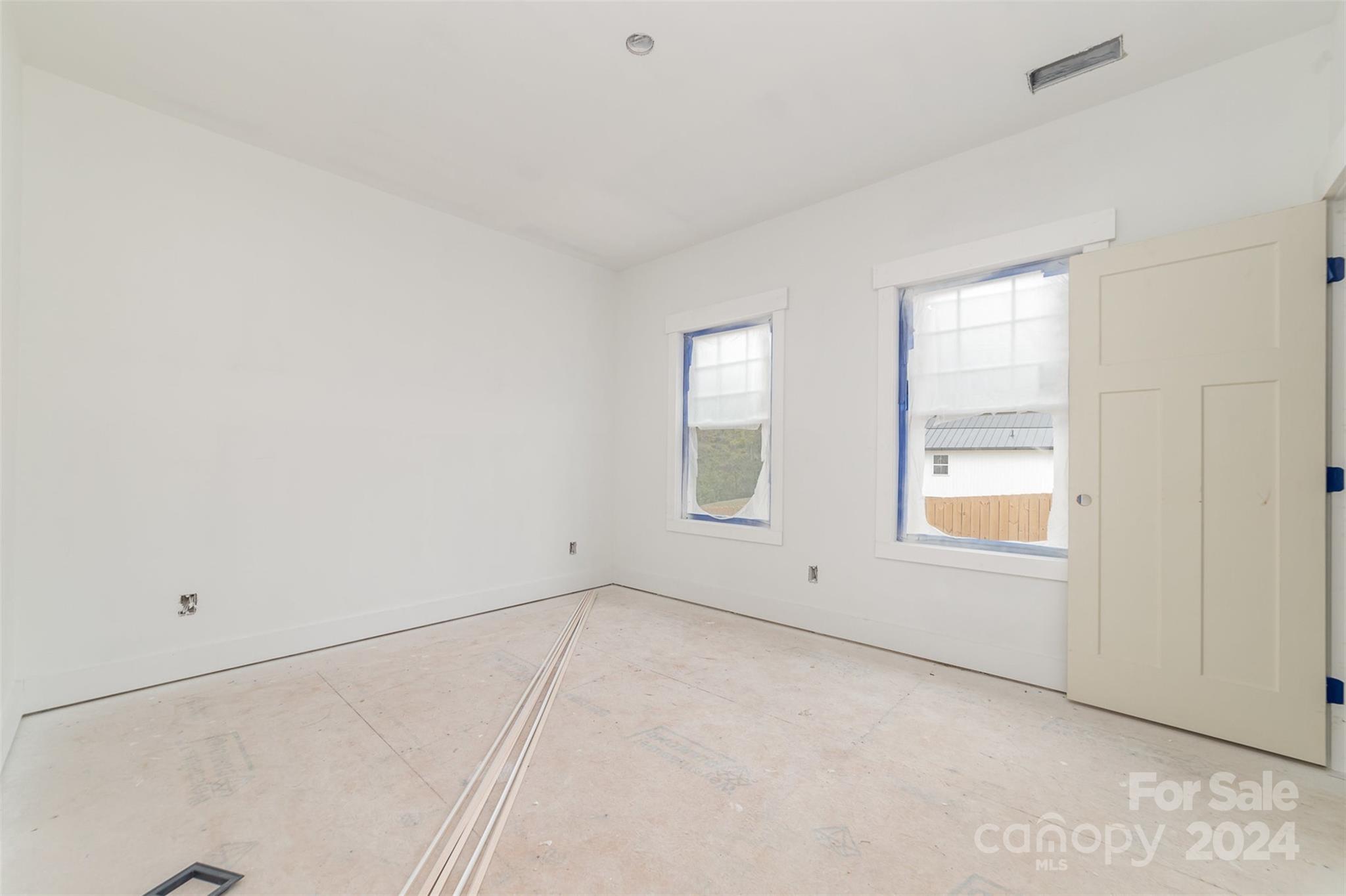 1820 Red Angus Road Mount Pleasant, NC 28124 - Photo 17 of 24 an empty room with windows