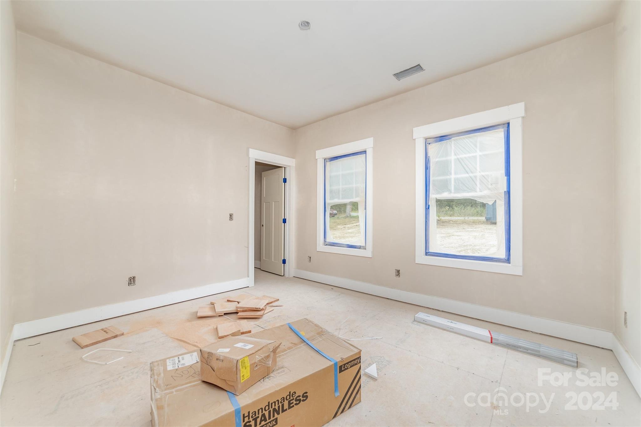 1820 Red Angus Road Mount Pleasant, NC 28124 - Photo 18 of 24 an empty room with windows