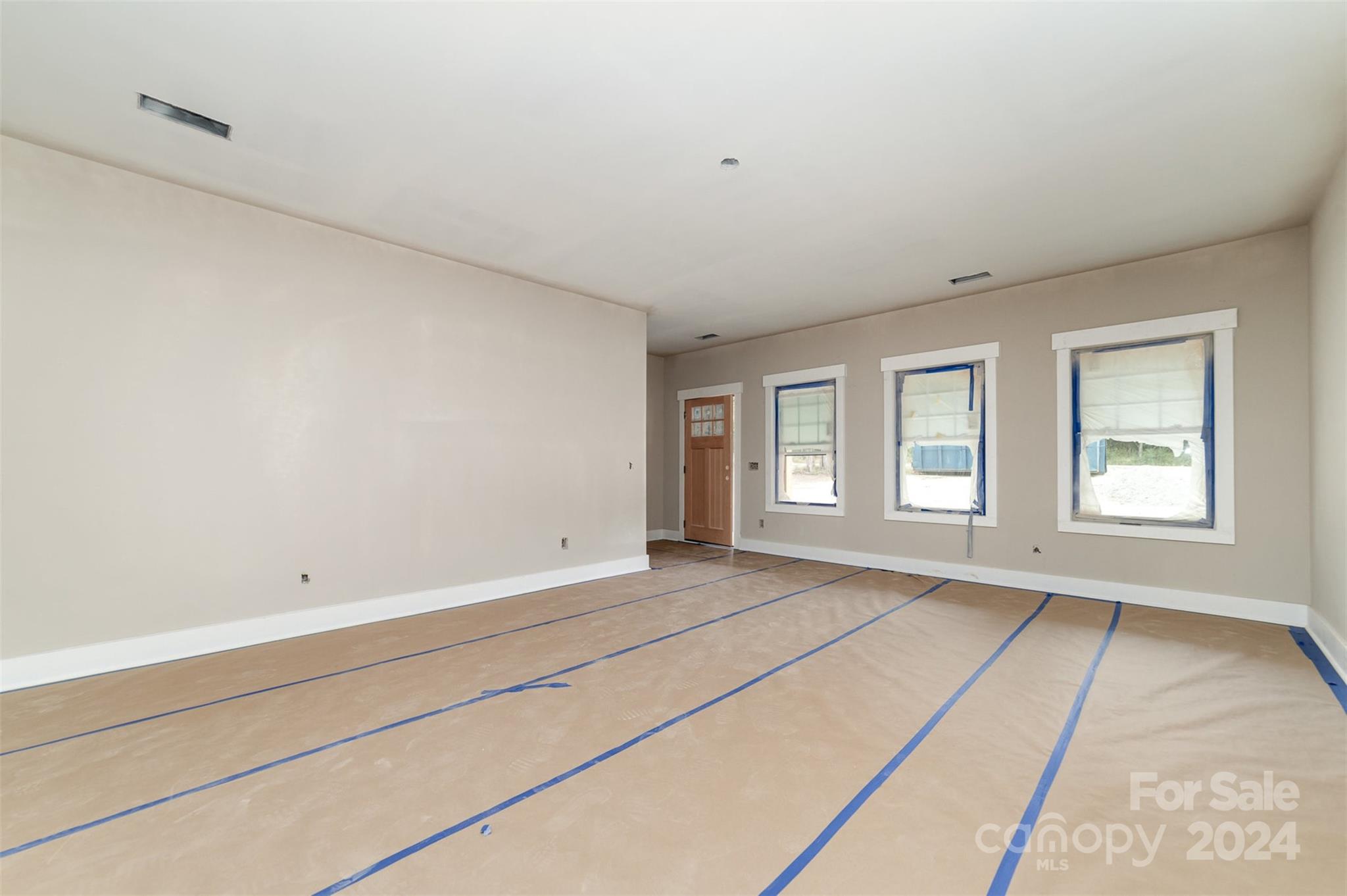 1820 Red Angus Road Mount Pleasant, NC 28124 - Photo 6 of 24 a view of an empty room with a window