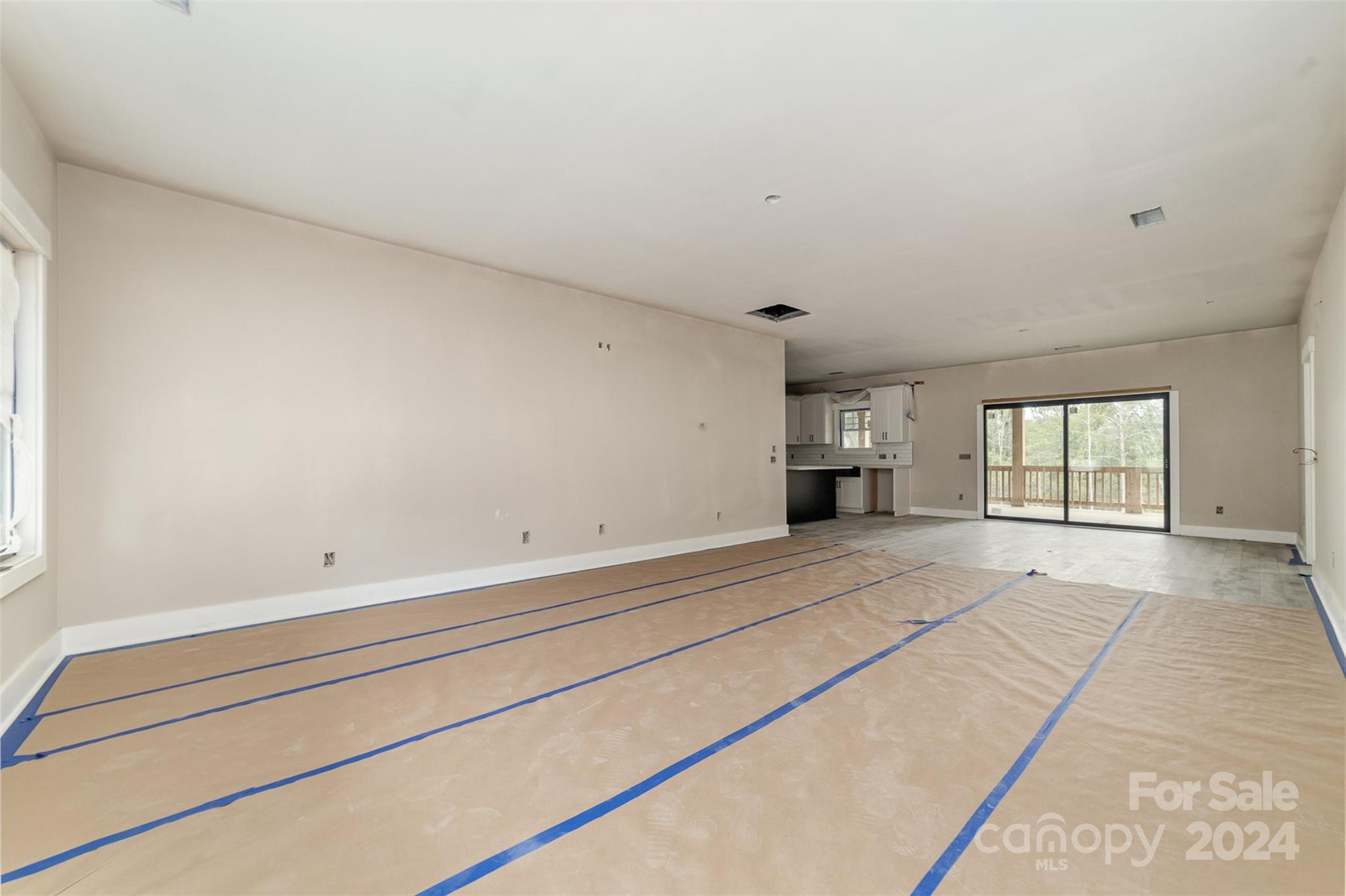 1820 Red Angus Road Mount Pleasant, NC 28124 - Photo 7 of 24 a view of empty room with wooden floor and window