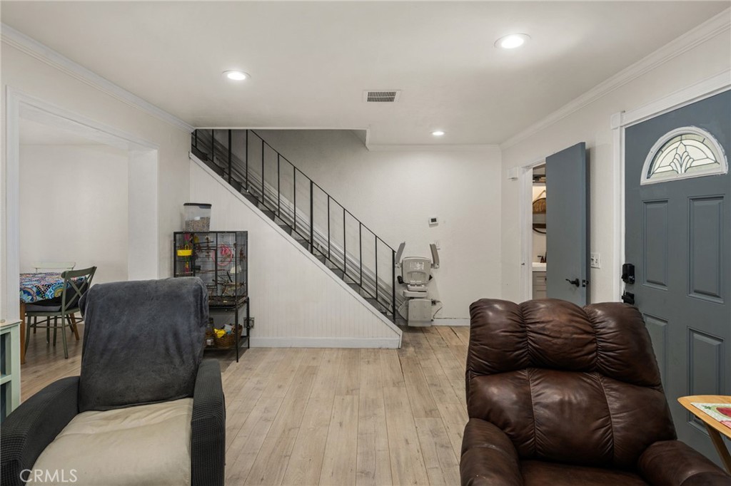 7381 Katella Avenue Stanton, CA 90680 - Photo 19 of 21 family room leading up stairs