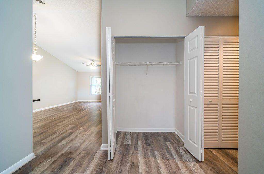 12969 Pennypacker Trail, Unit 15 Wellington, FL 33414 - Photo 15 of 25 a view of a room with wooden floor