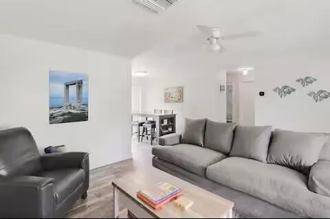 a living room with furniture and a couch