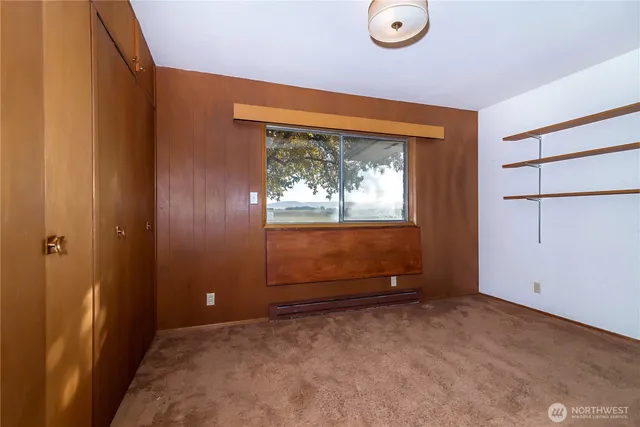 an empty room with window