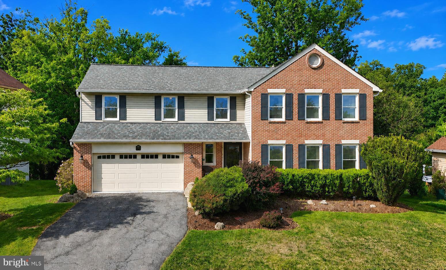 2108 Merrifields Drive Silver Spring, MD 20906 - Photo 1 of 69 a front view of a house with a yard