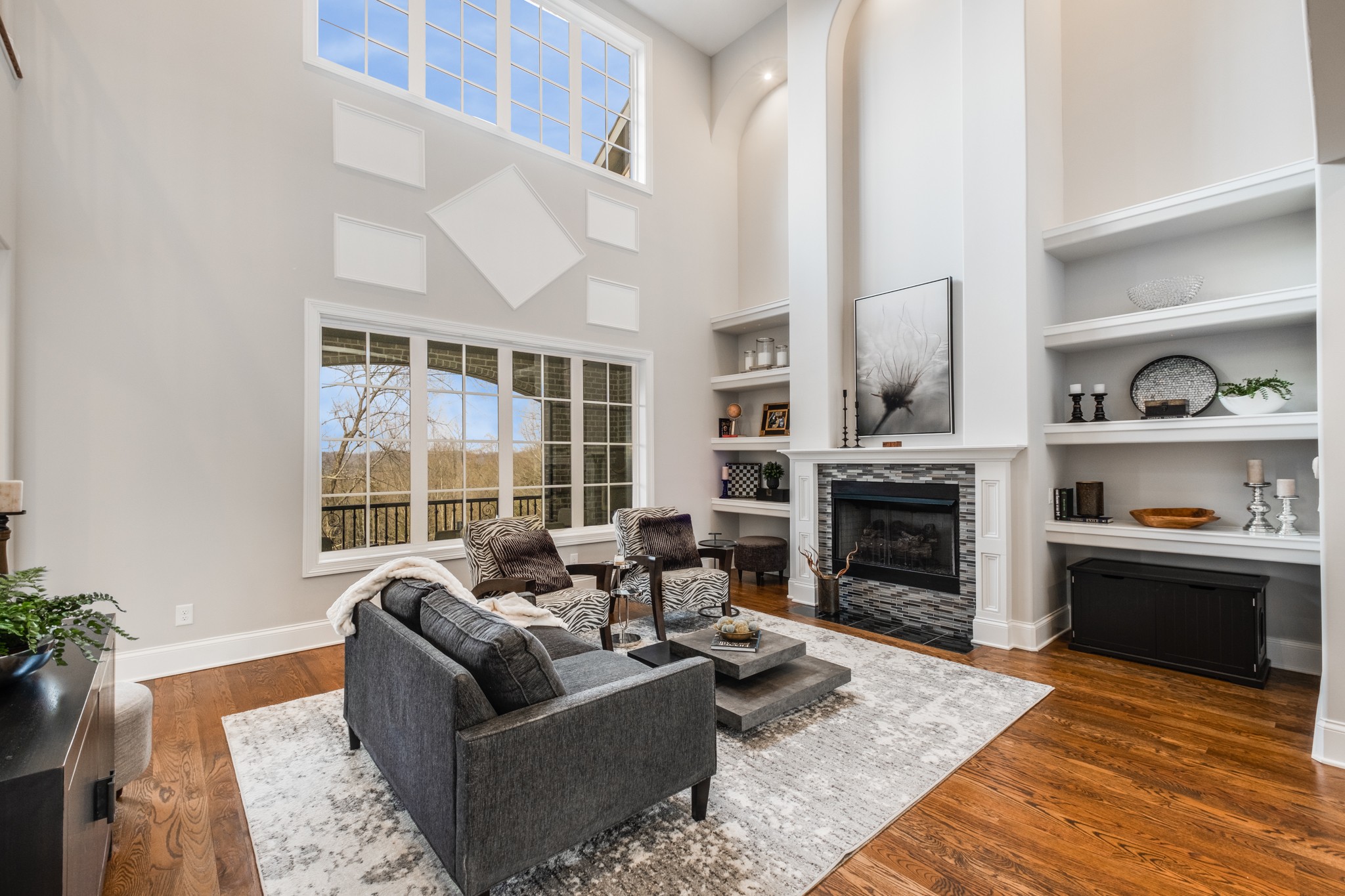 514 Legends Ridge Court Franklin, TN 37069 - Photo 12 of 57 a living room with furniture window and a fireplace