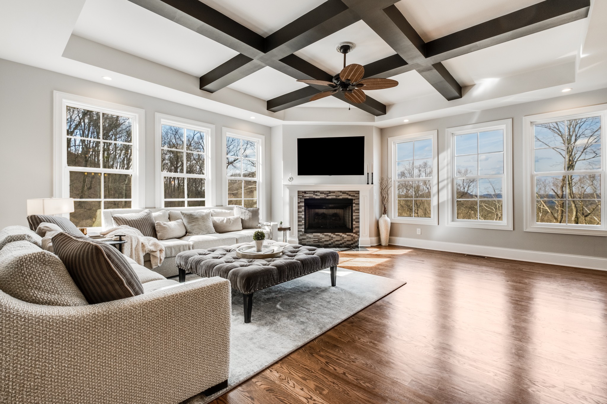 514 Legends Ridge Court Franklin, TN 37069 - Photo 14 of 57 a living room with furniture a fireplace and a flat screen tv