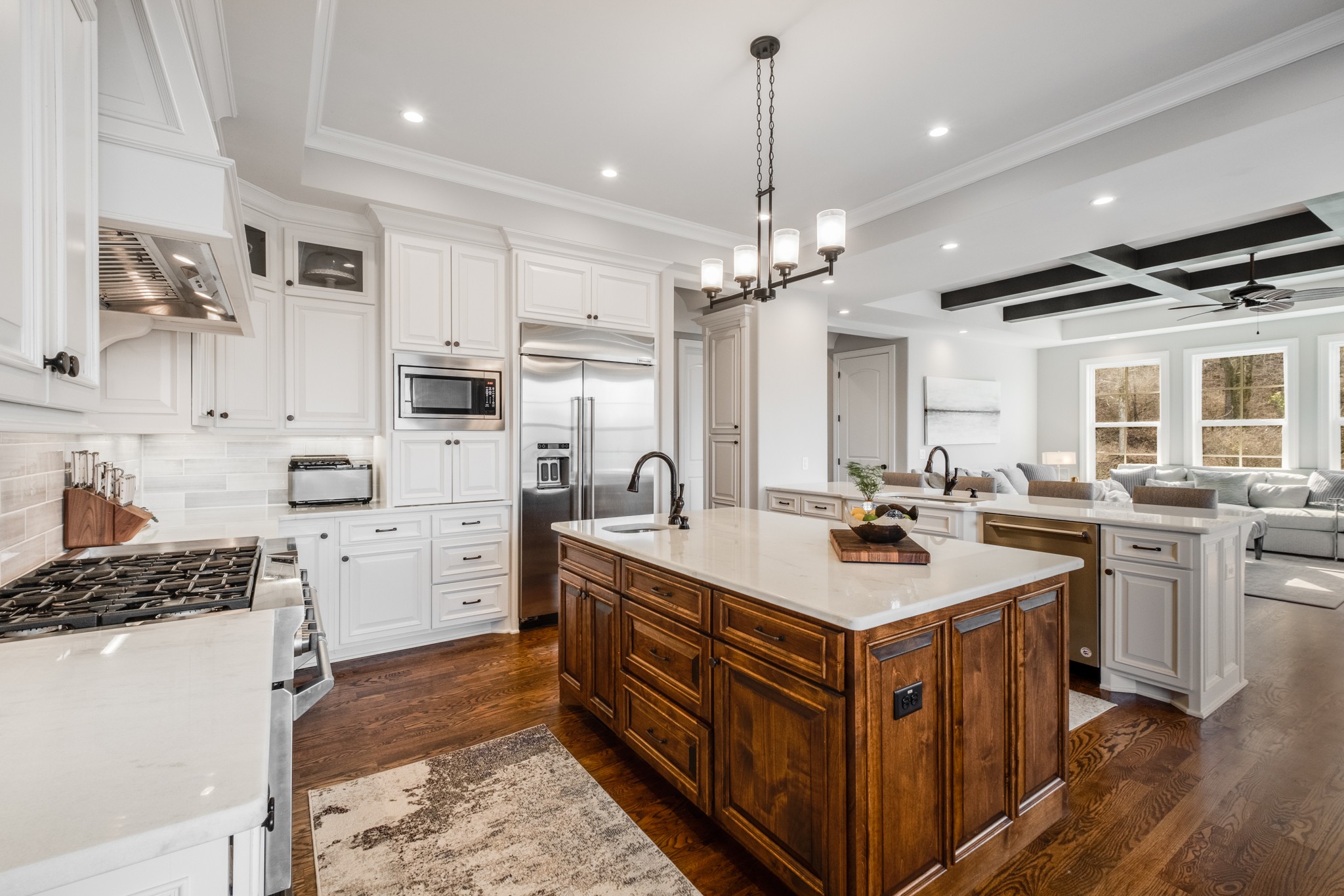 514 Legends Ridge Court Franklin, TN 37069 - Photo 19 of 57 a kitchen that has a lot of cabinets in it and wooden floors