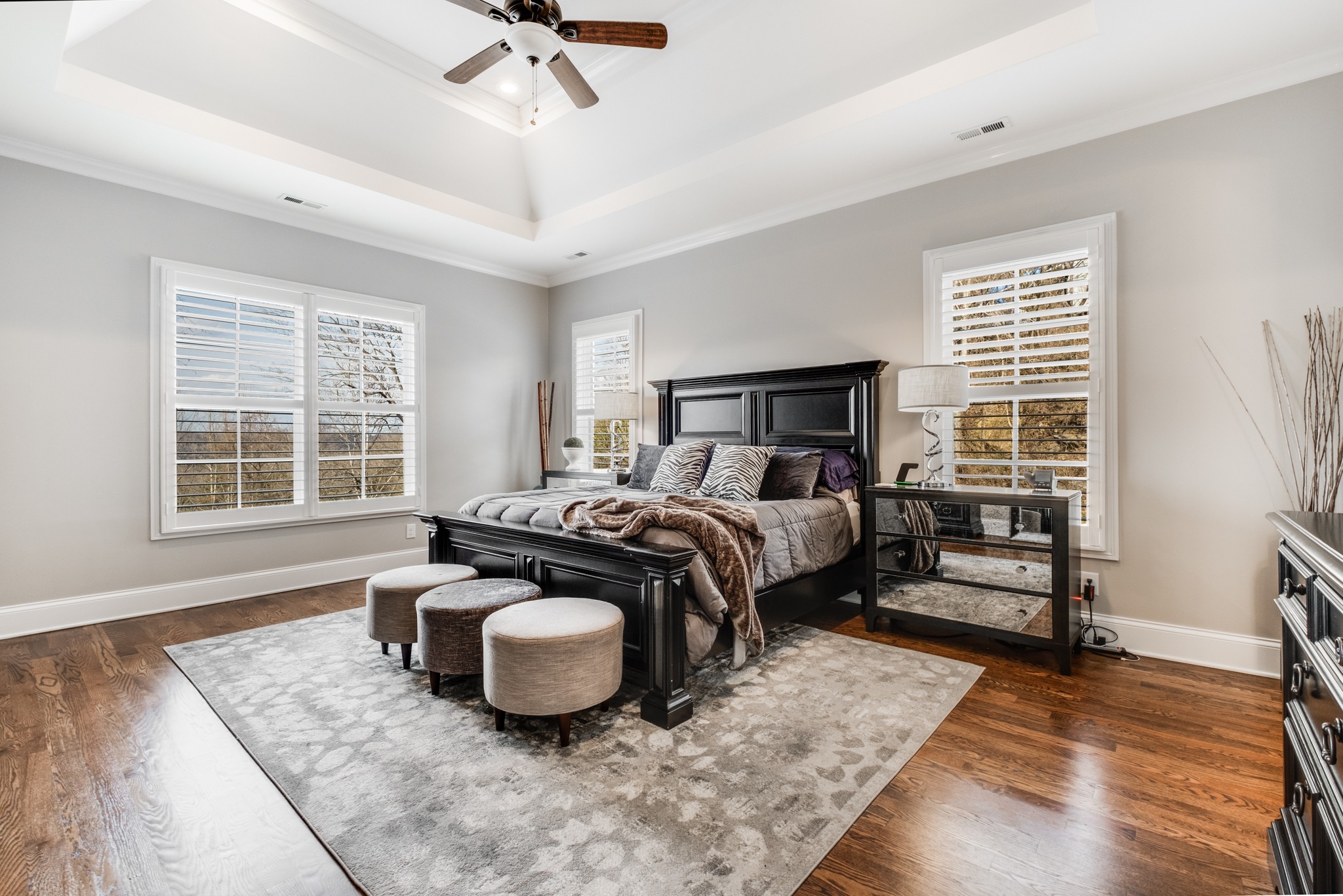 514 Legends Ridge Court Franklin, TN 37069 - Photo 21 of 57 a bedroom with a bed and wooden floor