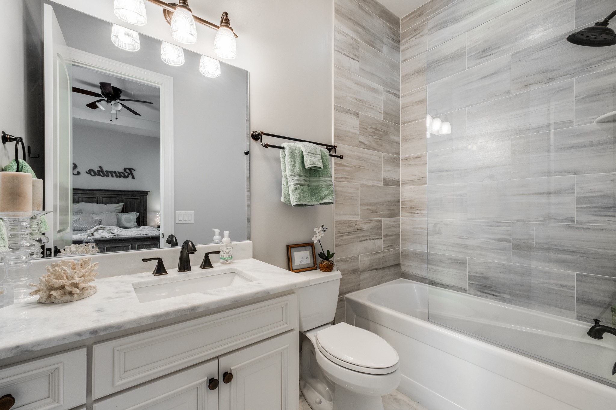 514 Legends Ridge Court Franklin, TN 37069 - Photo 31 of 57 a bathroom with a sink a toilet tub and shower