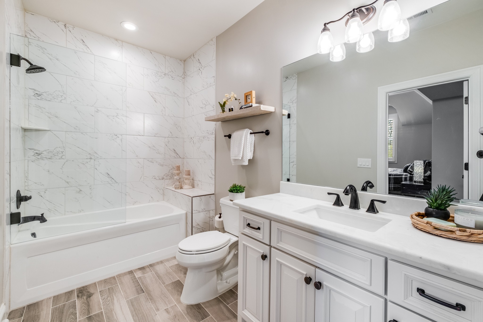 514 Legends Ridge Court Franklin, TN 37069 - Photo 42 of 57 a bathroom with a sink a toilet and shower