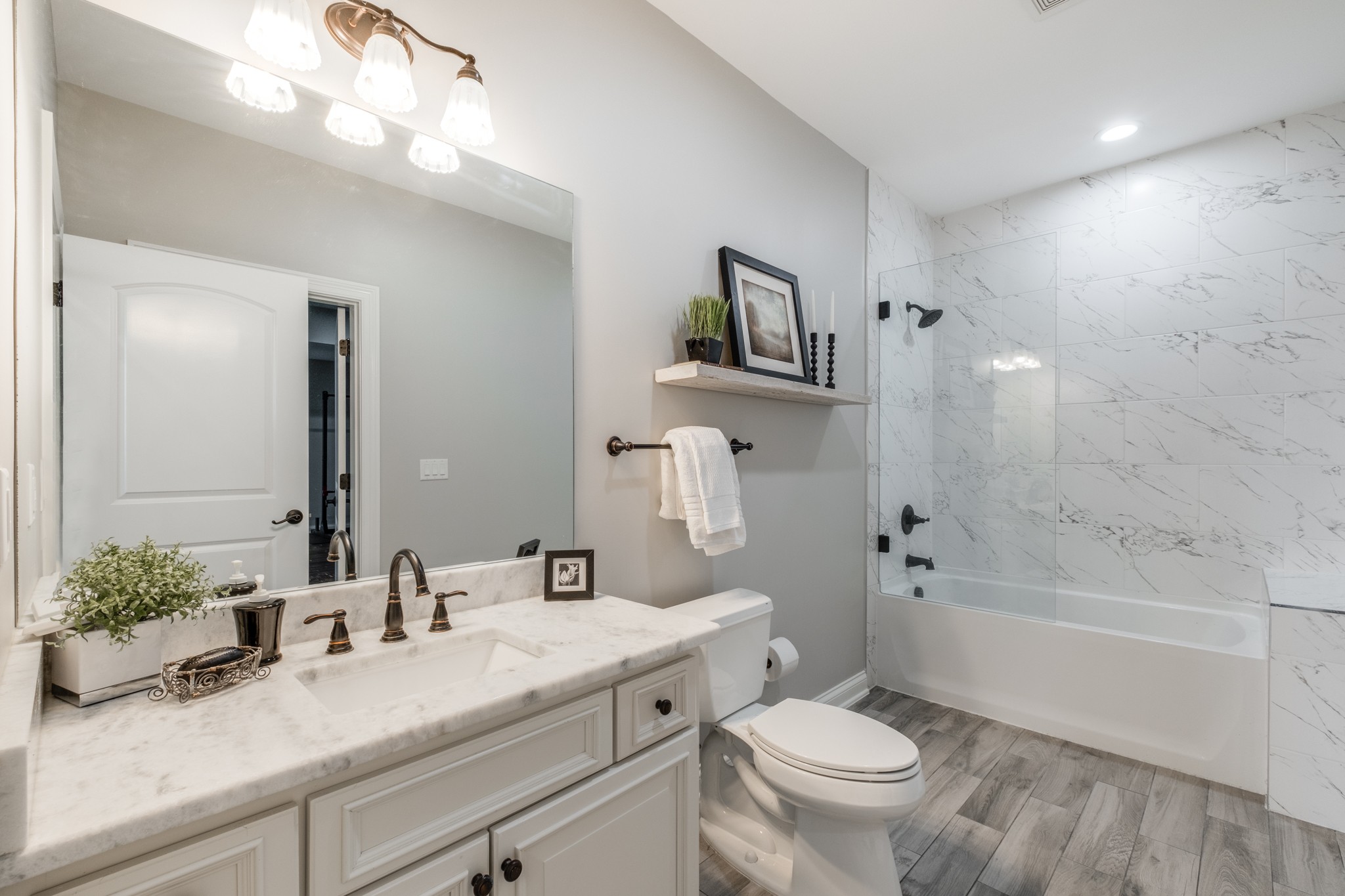 514 Legends Ridge Court Franklin, TN 37069 - Photo 47 of 57 a bathroom with a sink a toilet and shower
