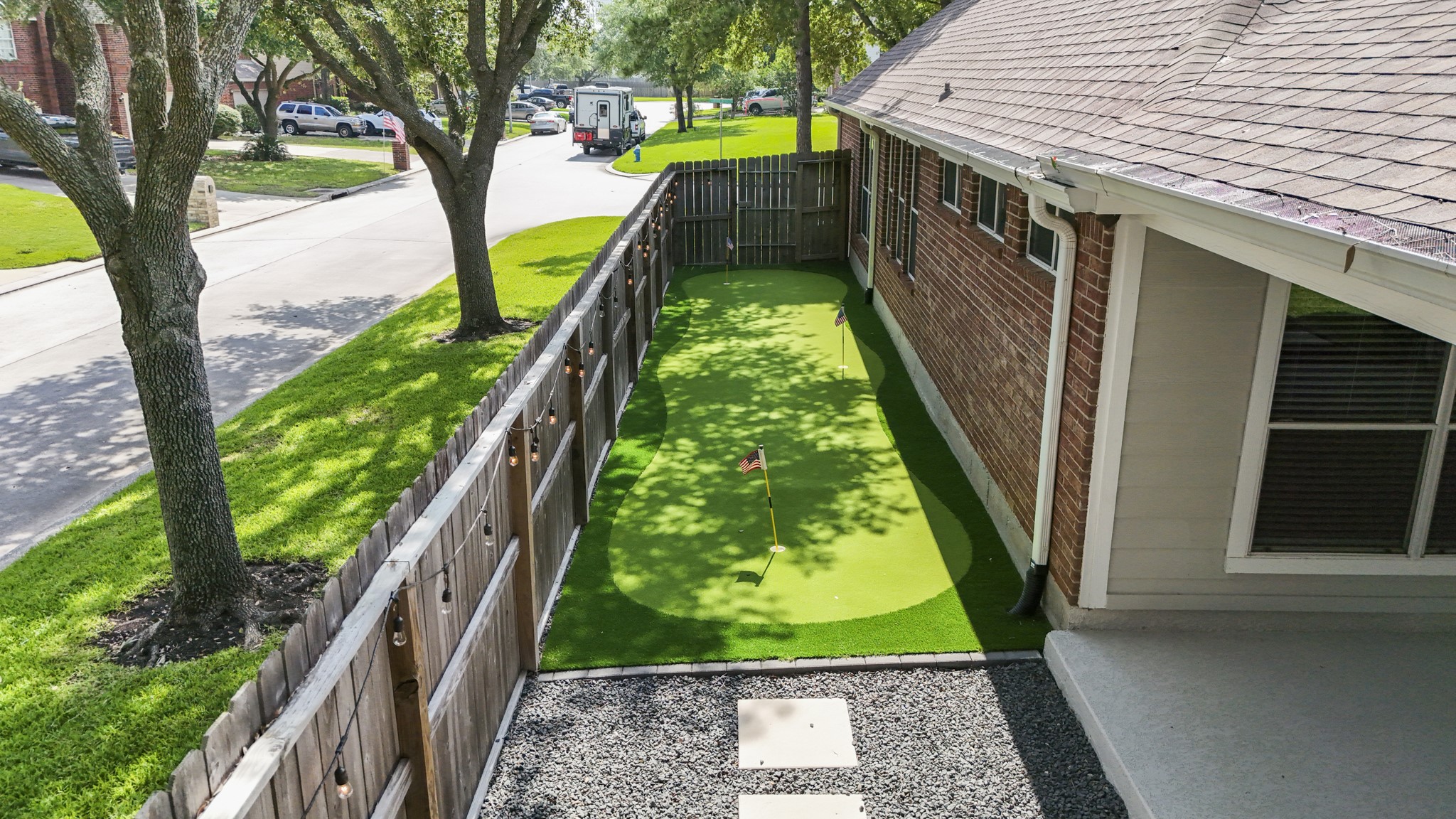 5802 Sawyer Bend Lane Spring, TX 77379 - Photo 38 of 50 a backyard of a house with lots of green space