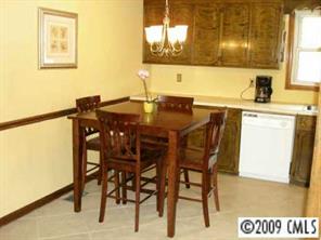 4809 Union Road Gastonia, NC 28056 - Photo 5 of 8 a view of a dining room with furniture and a window