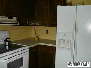 4809 Union Road Gastonia, NC 28056 - Photo 6 of 8 a kitchen with a refrigerator and a sink