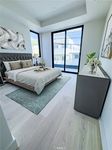 a view of an empty room with windows