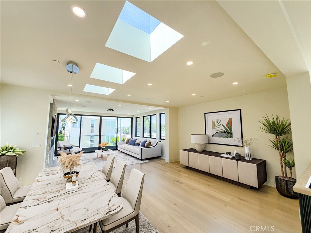 404 16th Street Manhattan Beach, CA 90266 - Photo 30 of 58 a living room with furniture and a large window