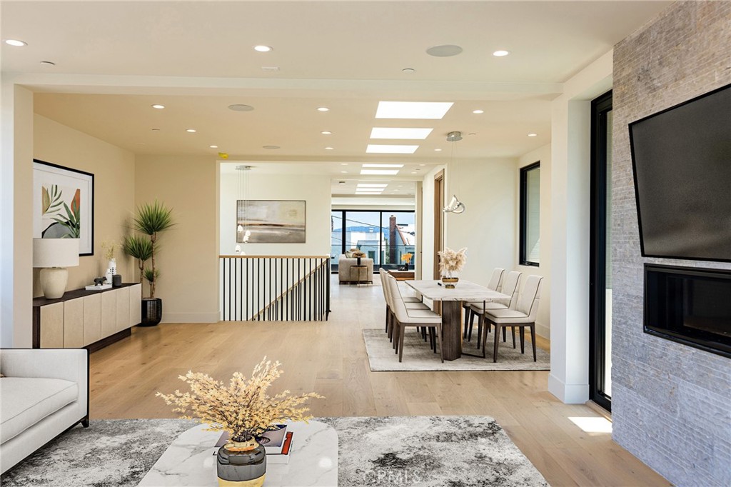 404 16th Street Manhattan Beach, CA 90266 - Photo 32 of 58 a living room with furniture wooden floor and a flat screen tv