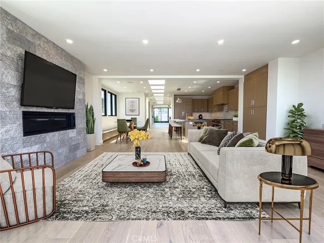 a spacious bathroom with a granite countertop sink and a mirror