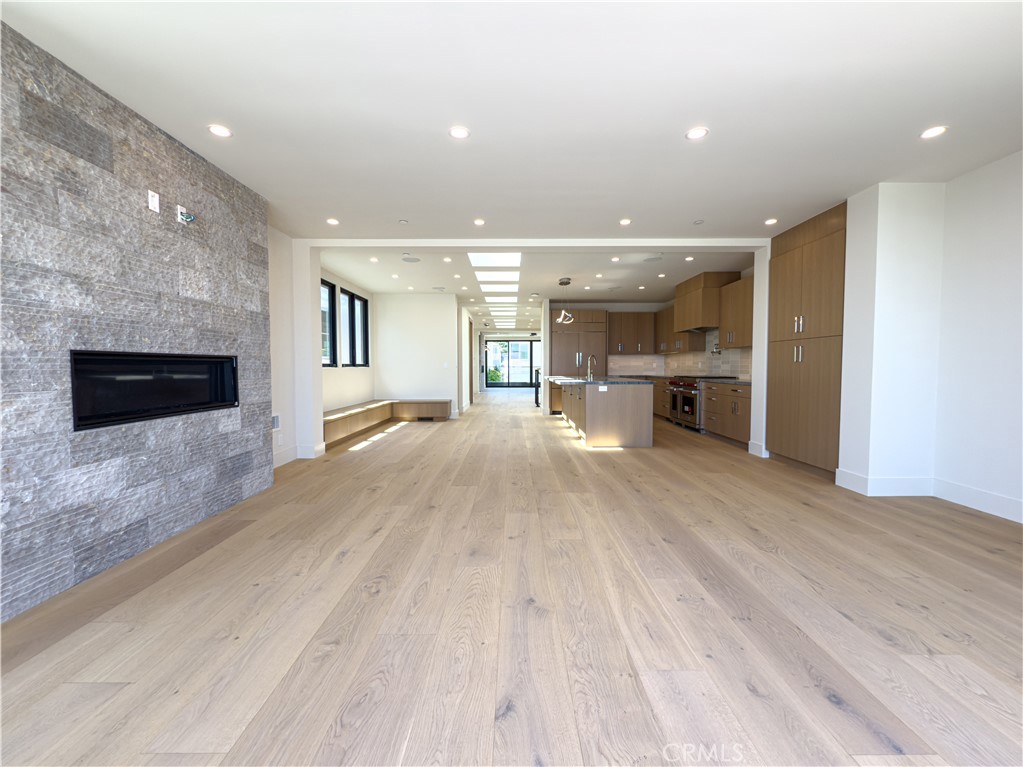 404 16th Street Manhattan Beach, CA 90266 - Photo 35 of 58 a view of a kitchen with a sink and a fireplace