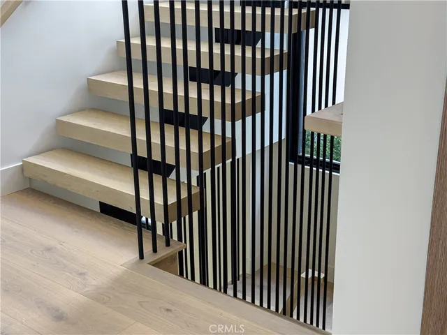 a view of living room with furniture and flat screen tv