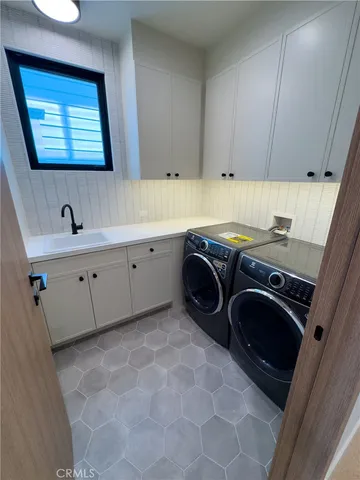a bathroom with a shower and a mirror