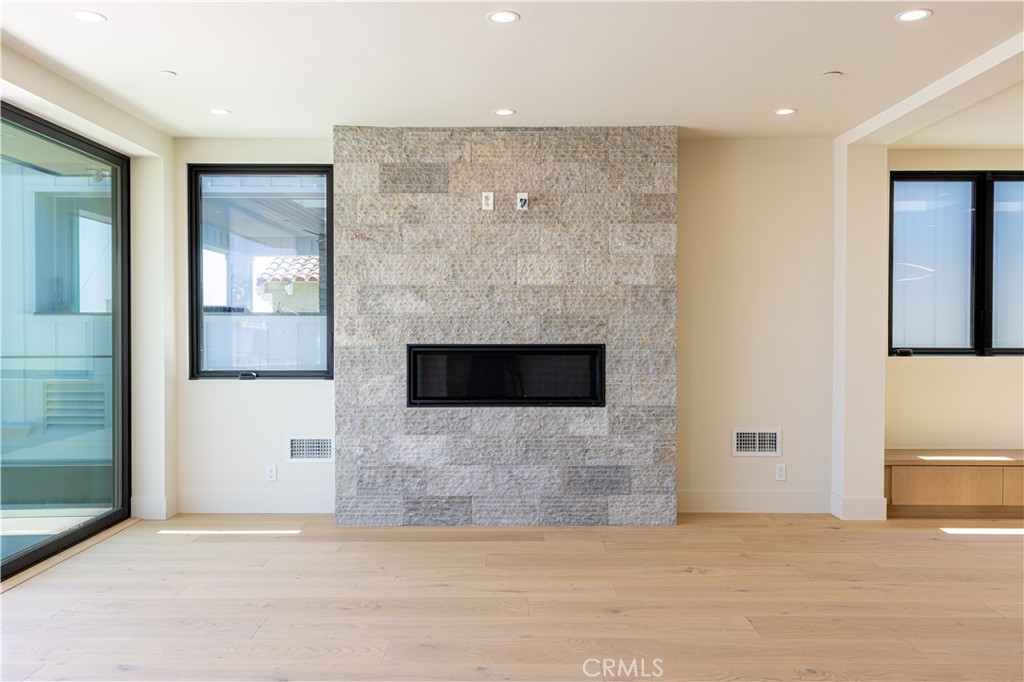 404 16th Street Manhattan Beach, CA 90266 - Photo 50 of 58 a view of an empty room with glass door and a bathroom