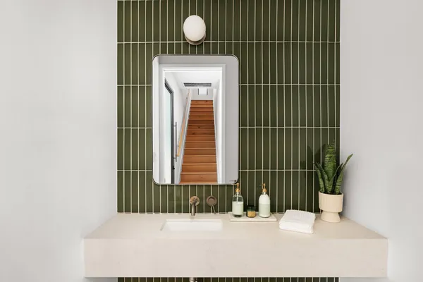 a bedroom with a large bed and a large window