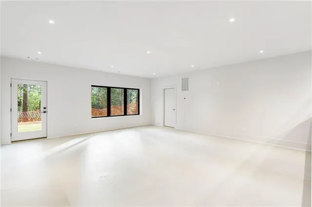 an empty room with windows