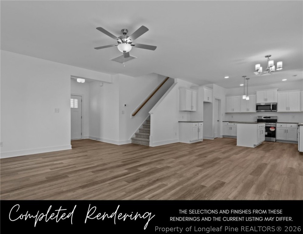 152 South View Spur Road Raeford, NC 28376 - Photo 2 of 9 a view of kitchen and hall with wooden floor