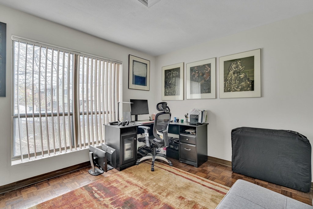 405 Langley Road, Unit 6 Newton, MA 02459 - Photo 39 of 42 a workspace with furniture and window