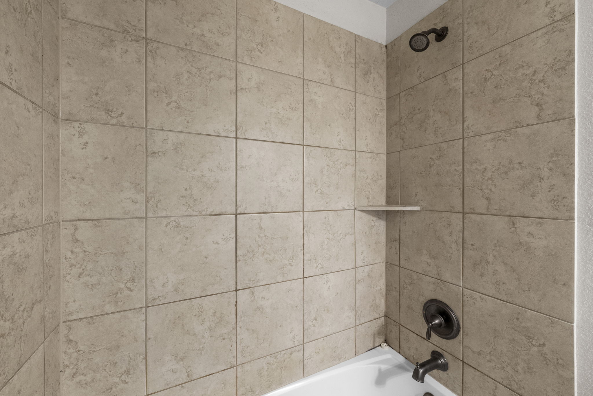 1617 Treeta Trail Kyle, TX 78640 - Photo 22 of 39 Bathroom view of shower / washtub combination
