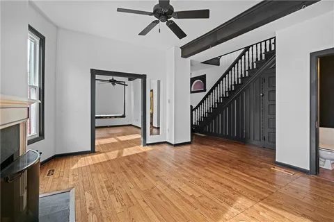 a bathroom with a sink mirror and vanity