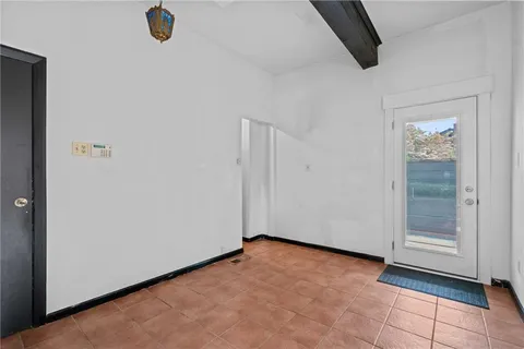 a car parked in front of a house