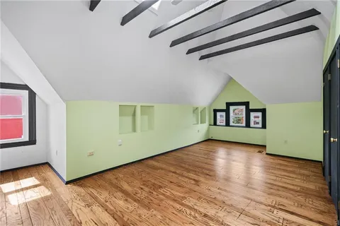 an aerial view of a city with lots of residential buildings