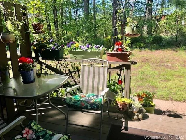 a view of a table and chairs in patio