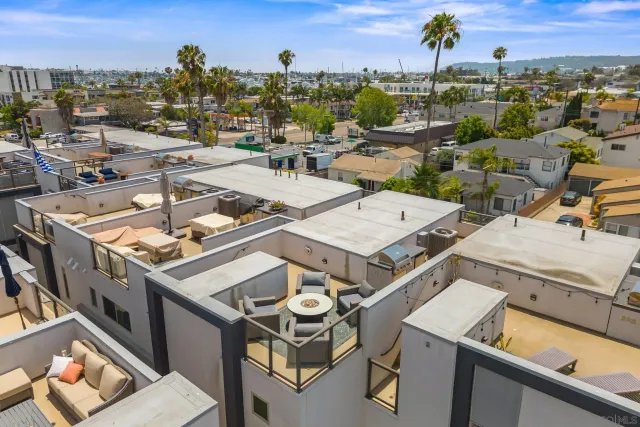 an aerial view of a house with outdoor space