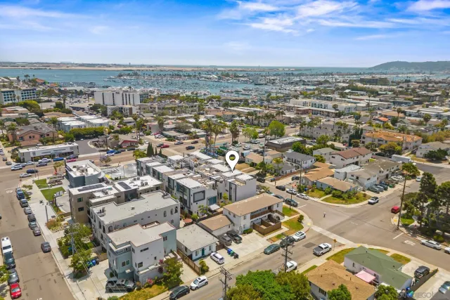 an aerial view of residential building with parking space