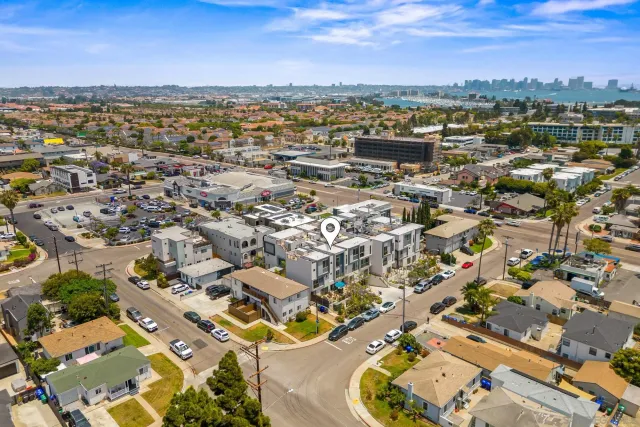 an aerial view of a city with lots of residential buildings