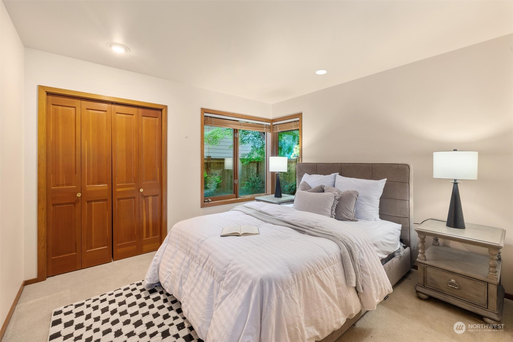 3511 217th Place Southeast Bothell, WA 98021 - Photo 18 of 39 a bedroom with a bed and a lamp
