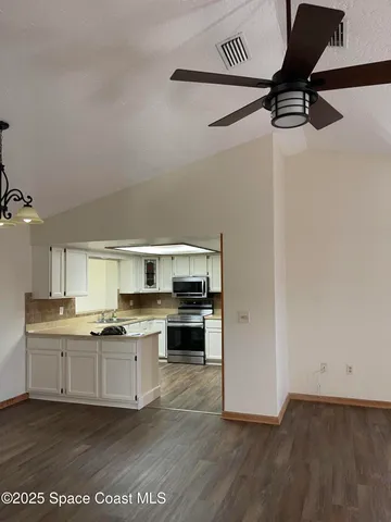 a view of a hallway to a room