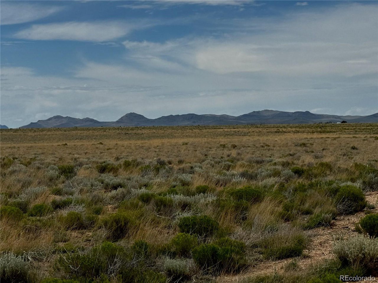 16 Little Beaver Road San Luis, CO 81152 - Photo 4 of 12 a view of an lake and mountain view