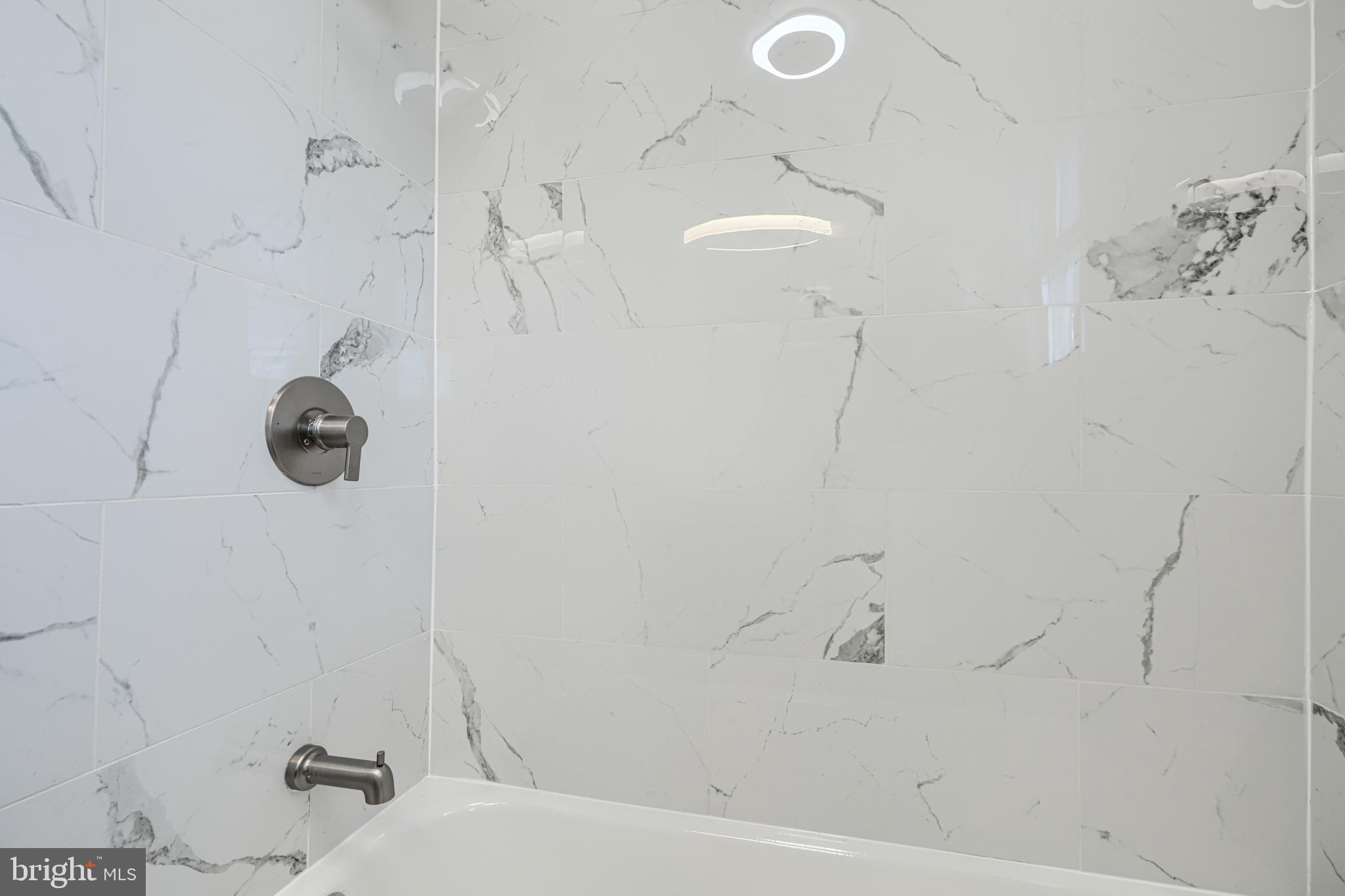 4400 Manorview Road Baltimore, MD 21229 - Photo 13 of 30 a bathroom with a shower