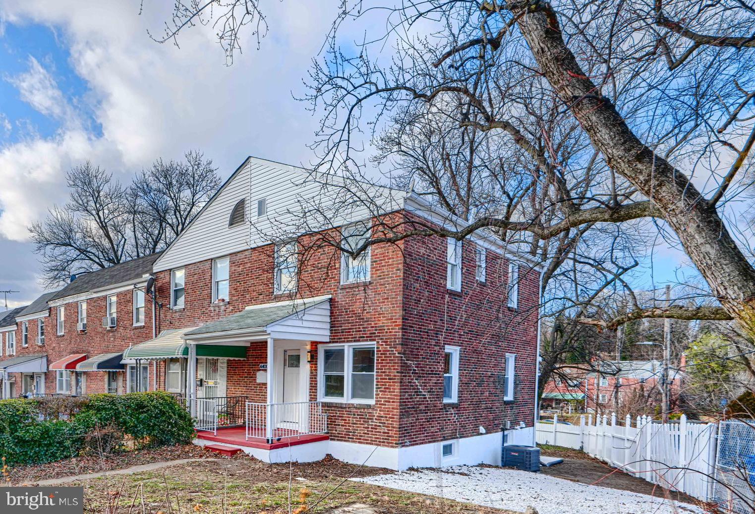 4400 Manorview Road Baltimore, MD 21229 - Photo 22 of 30 a view of a building with a large tree